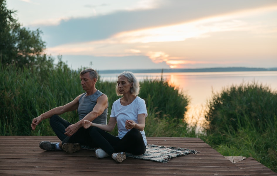 Healthcare professionals practicing meditation to prevent burnout