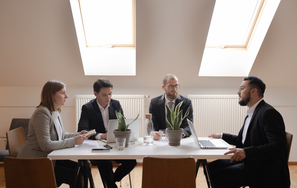 Group of doctors and healthcare professionals planning deligation of their their tasks