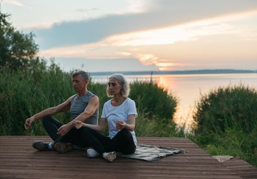 Healthcare professionals practicing meditation to prevent burnout