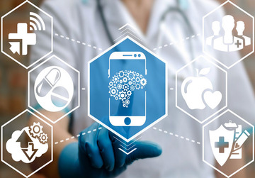 A-healthcare-professional-is-seen-using-internet-of-things-to-access-the-various-records-connected-to-the-mobile-via-internet